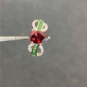 Red tourmaline pear shape ring with green tourmaline/cz on the side